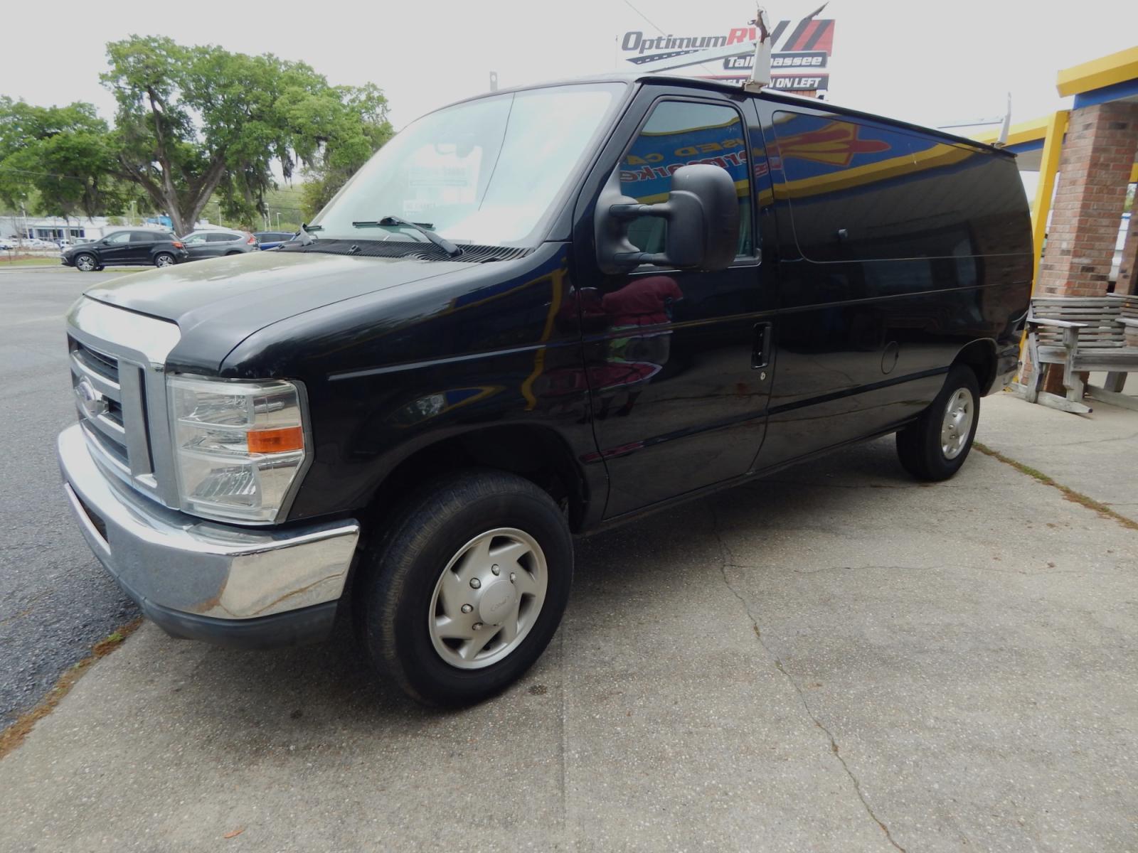 2014 Black Ford E-Series Van (1FTNE1EW6ED) with an V8 engine, Automatic transmission, located at 3120 W Tennessee St, Tallahassee, FL, 32304-1002, (850) 575-6702, 30.458841, -84.349648 - Used Car Supermarket is proud to present you with this loaded immaculate 2014 Ford E150 Econoline Work Van. Used Car Supermarket prides itself in offering you the finest pre-owned vehicle in Tallahassee. Used Car Supermarket has been locally family owned and operated for over 48 years. Our E150 Work - Photo #0